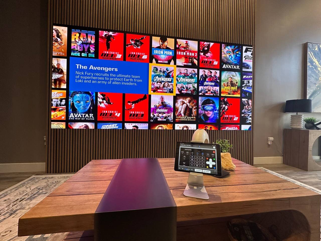 Just Video Walls 0.9mm pixel-pitch LED wall in the Beyond Audio Scottsdale showroom, running a Kaleidescape movie library through a MadVR Envy video processor.